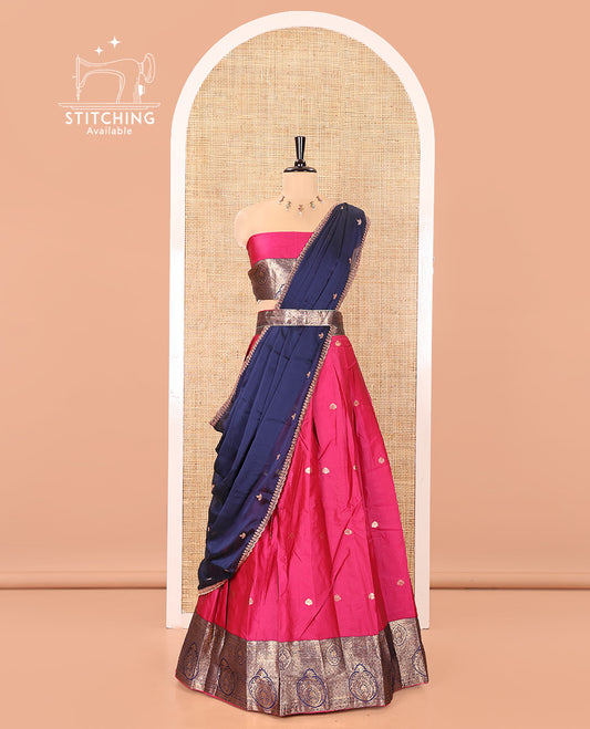 Pink and Navy Blue Semi-Banarasi Half-Saree, Elegantly Woven with Zari Buttas on Its Skirt, Complemented by a Contrast Intricately Zari-Designed Border, Paired with a Matching Blouse, and a Contrast Satin Georgette Embroidered Scallop Dhavani