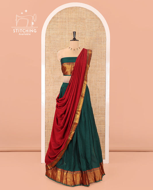 Bottle Green Mercerised Cotton Half-Saree Features Plain with Contrast Traditional Zari Temple Bordered Skirt, Paired with a Matching Blouse, and Comes with a Contrast Zari-Bordered Dhavani