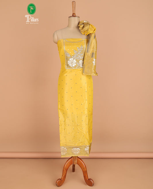 Yellow chudidhar material chanderi tissue neck weaving thread, floral butta top with satin cotton pants & chanderi tissue zari weaving dupatta