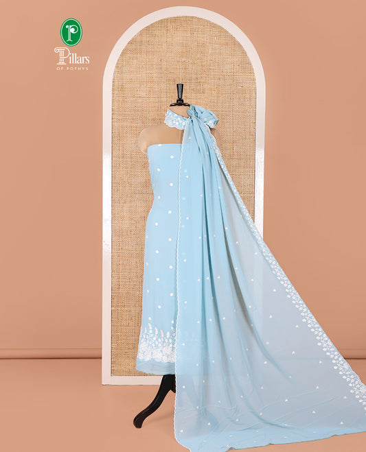 Blue Fox Georgette Material Chudidar Set, Gracefully Embellished with Floral Embroidery on Its Top, a Plain Santoon Bottom, and Paired with a Floral Embroidered Scallop Dupatta