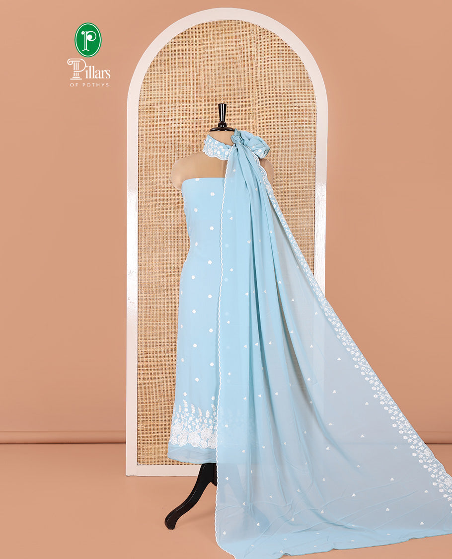 Blue Fox Georgette Material Chudidar Set, Gracefully Embellished with Floral Embroidery on Its Top, a Plain Santoon Bottom, and Paired with a Floral Embroidered Scallop Dupatta