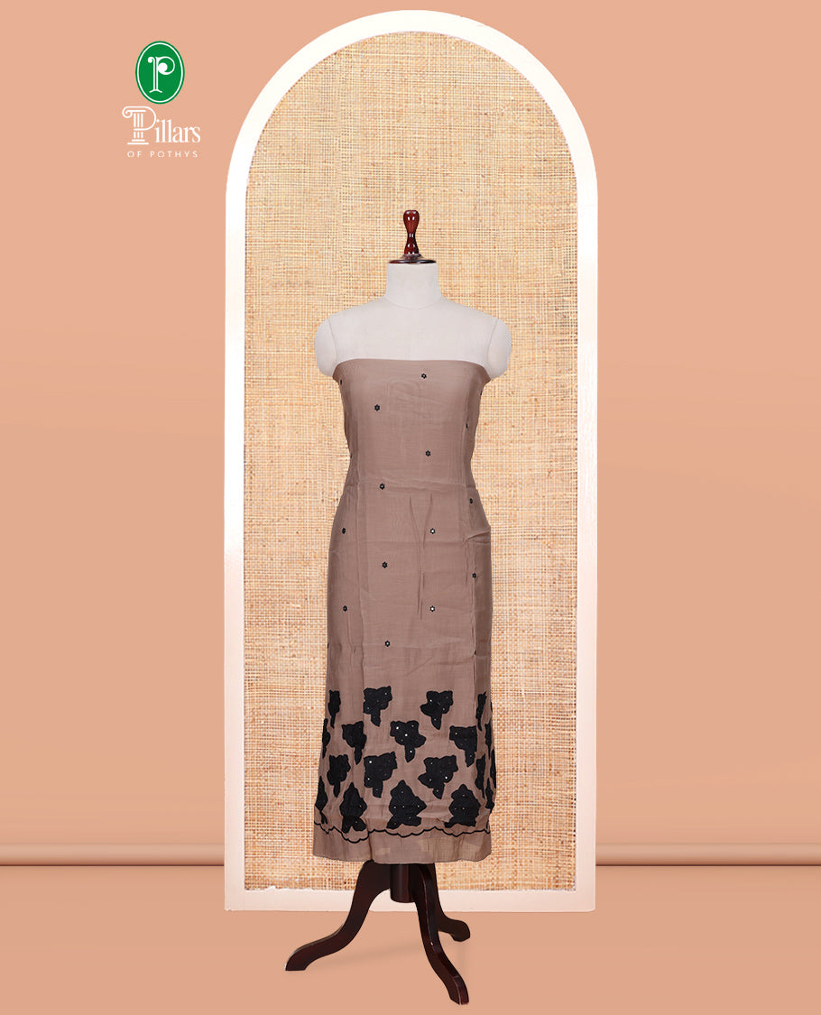 Light Brown Mul Chanderi Material Churidar Features Floral Thread Embroidered Top, a Matching Bottom, and an Scallop Embroidered Dupatta