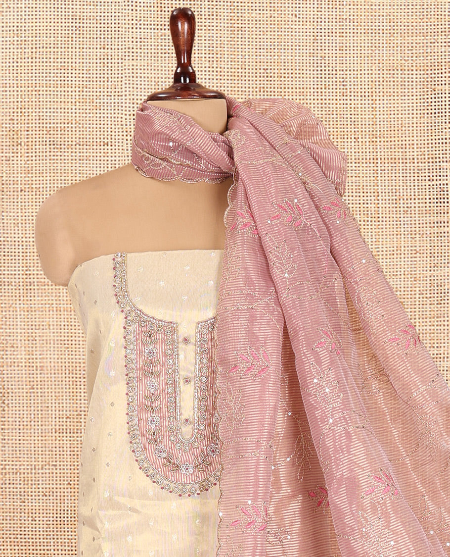Cream-Purple Banarasi Tissue Material Churidar Feature Embroidered Top, a Contrast Bottom, and Embroidered Dupatta