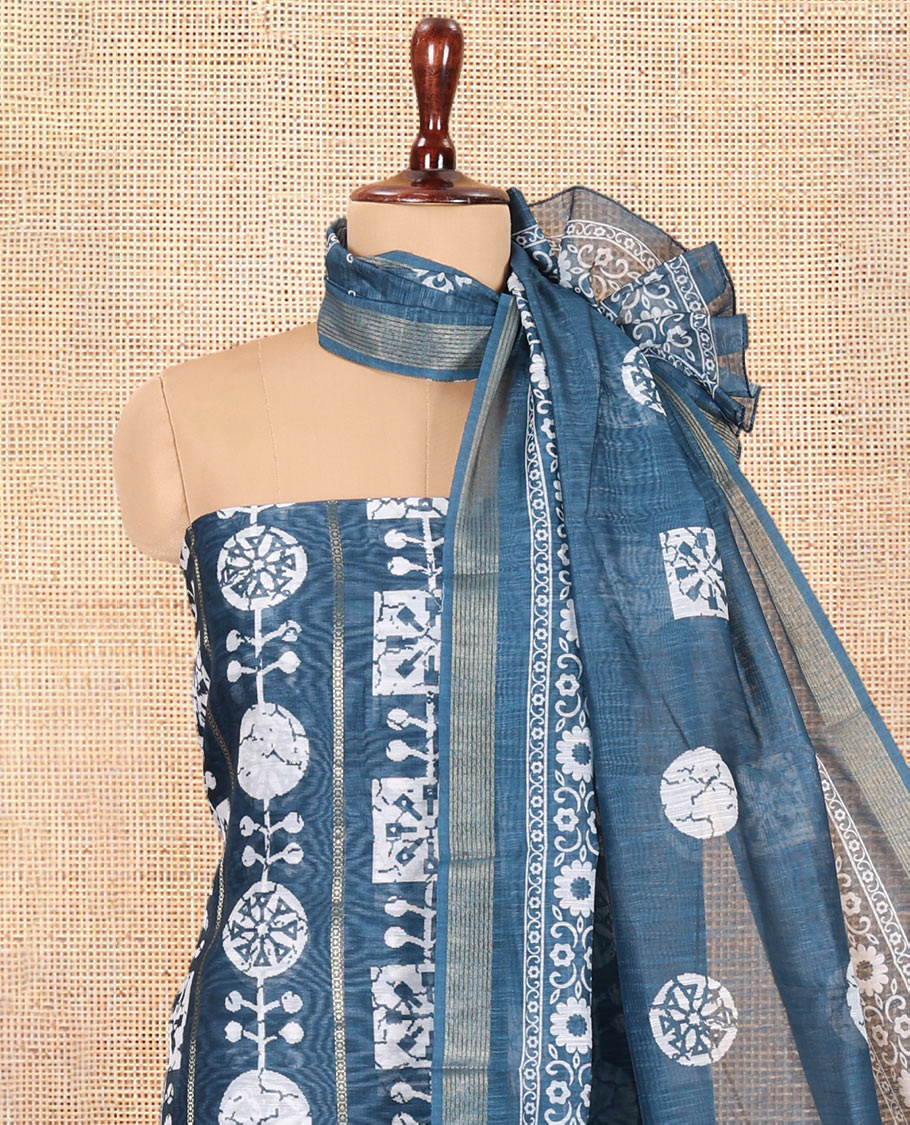 Peacock Blue Chanderi Material Chudidar Features Batik Printed Top, a Matching Bottom, and Batik Printed Dupatta