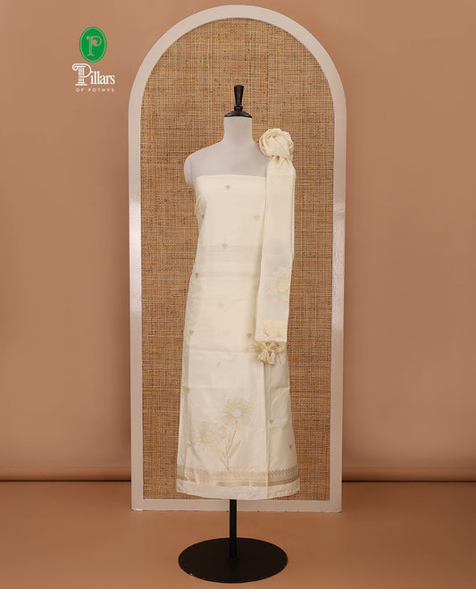 Kerala cream chudidar material,zari buttas & sunflower motif taffeta silk top, plain cream santoon bottom & sunflower zari motif dupatta