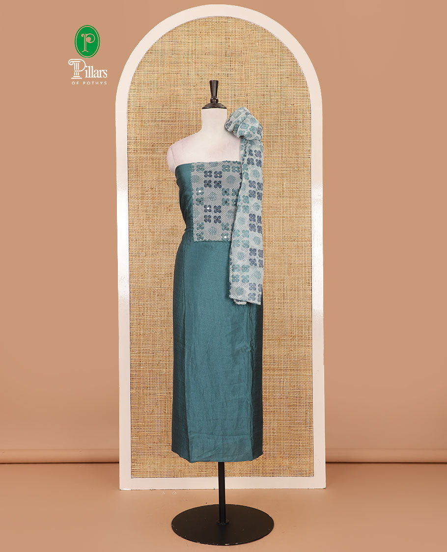 Dusky green Vichitra silk material chudidar set, brasso print & mirror embroidered neck work top, santoon bottom & four-petal floral motifs printed dupatta