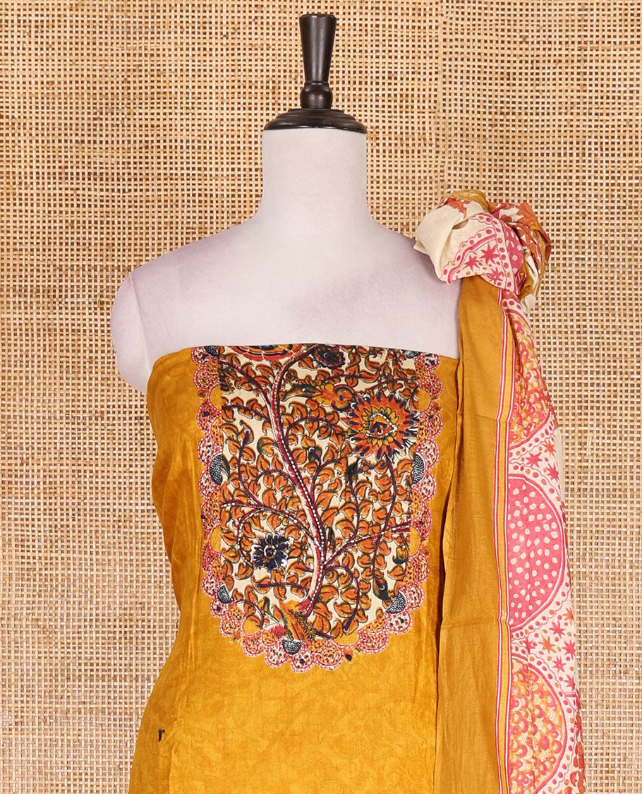 Mustard pure cotton material chudidar set, floral print with French knot and bead work top, plain cotton bottom, and floral-geometric printed dupatta