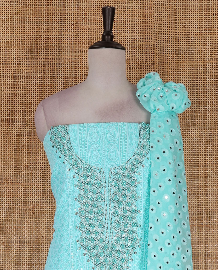 Aqua green material churidar set, stone work with Schiffli style embroidered georgette top, American Crape bottom, and polka dotted printed mirror work dupatta