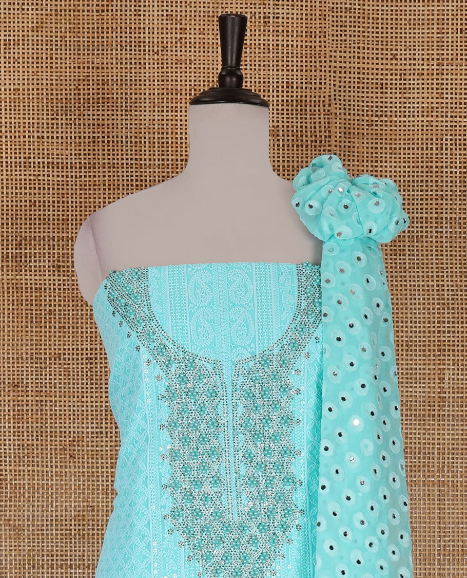 Aqua green material churidar set, stone work with Schiffli style embroidered georgette top, American Crape bottom, and polka dotted printed mirror work dupatta