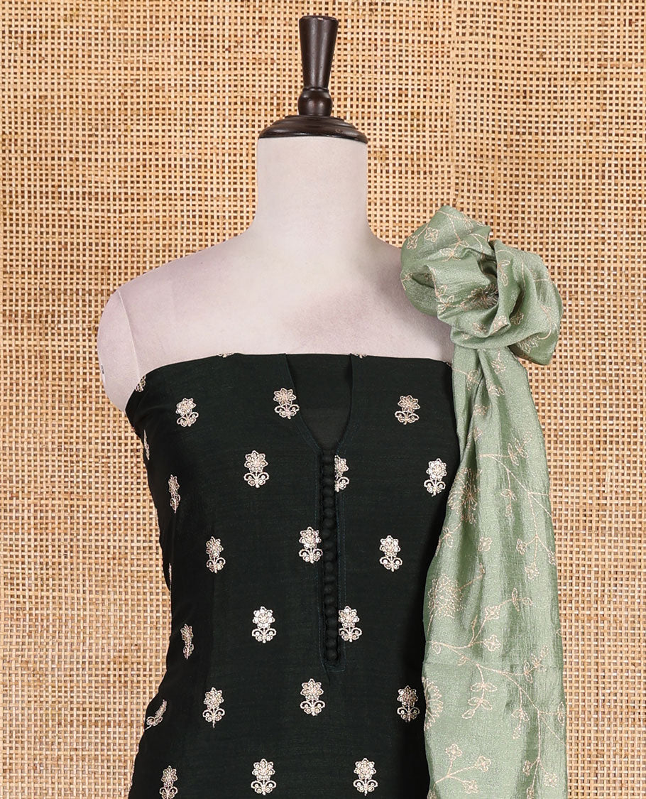 Dark green Vichitra silk material churidar set, floral motifs embroidered top, contrast Santoon bottom, and floral vine thread embroidered scallop dupatta