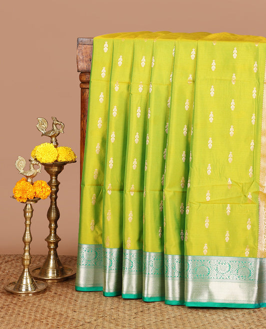 Green zari butta semi soft silk saree with kodi, bhavanji border & grand pallu along with plain blouse