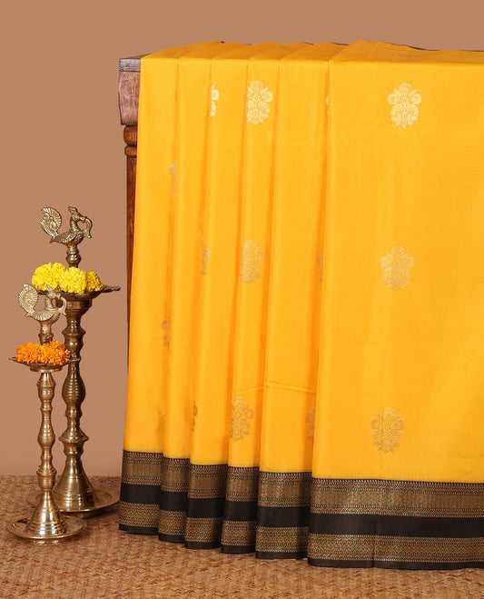 Yellow zari buttas semi-soft silk saree, contrast rettai pettu traditional zari border & grand ogee patterned pallu