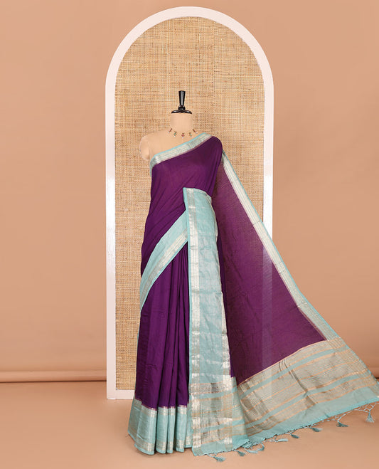 Purple plain Assam silk saree, contrast traditional zari border of rudraksham motifs, zari striped pallu, and a contrast zari bordered blouse