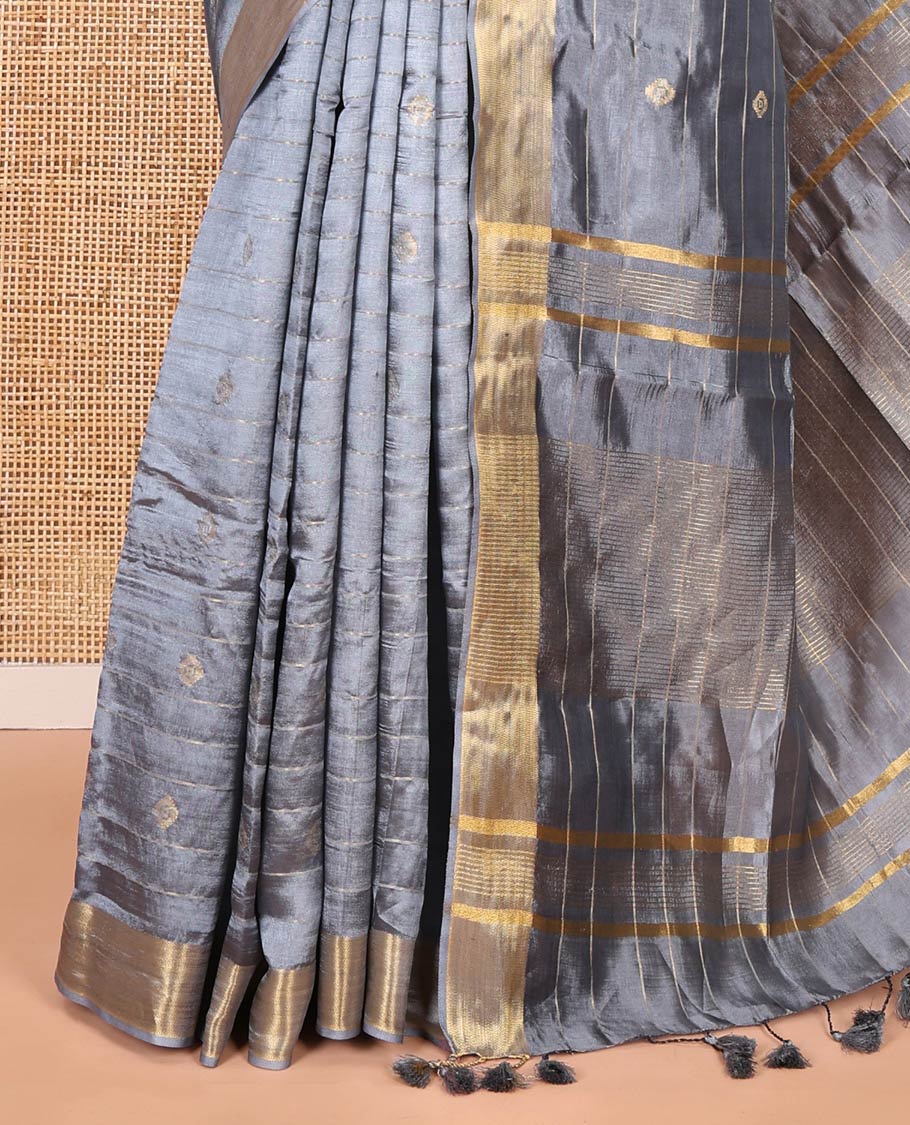 Grey zari buttas and striped banana pith saree, bavanji border, zari striped pallu, and a matching blouse