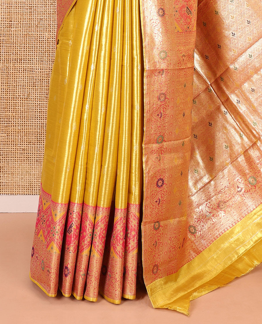 Mustard zari buttas tissue silk saree, contrast border of patola design and traditional motifs, jaal pallu, and a matching blouse