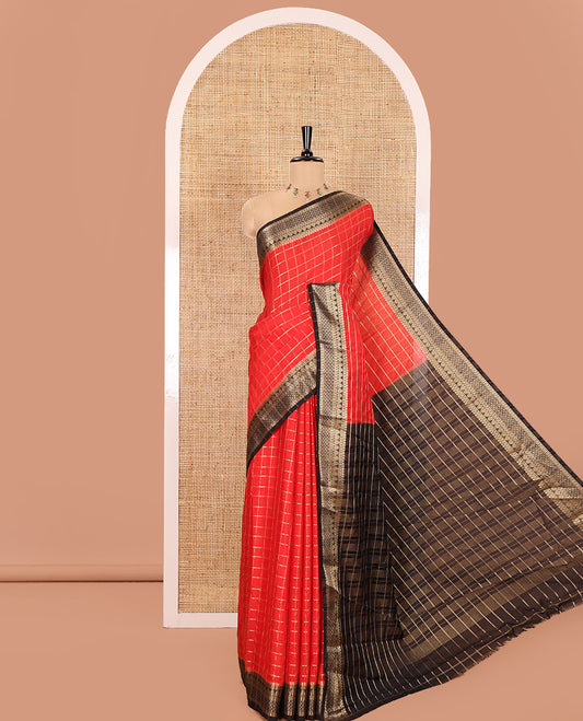 Red and Black Semi-Mysore Silk Saree Gleamed Up with Zari Checks All Over Its Body, Complemented by a Contrast Traditional Zari Design Woven Border, Captivating Zari Designs Woven Pallu, and Paired with a Contrast Blouse
