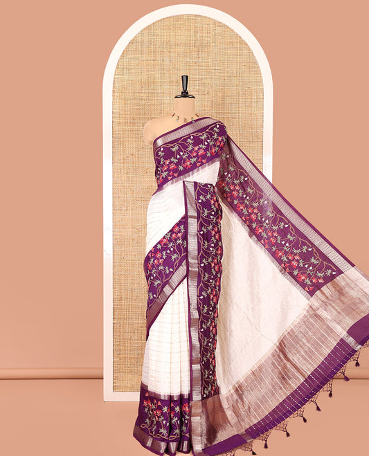 Off-White Assam Silk Saree Featuring Horizontal Zari Stripes, Contrast Floral Embroidered Border, Zari Striped Pallu, and Contrast Blouse