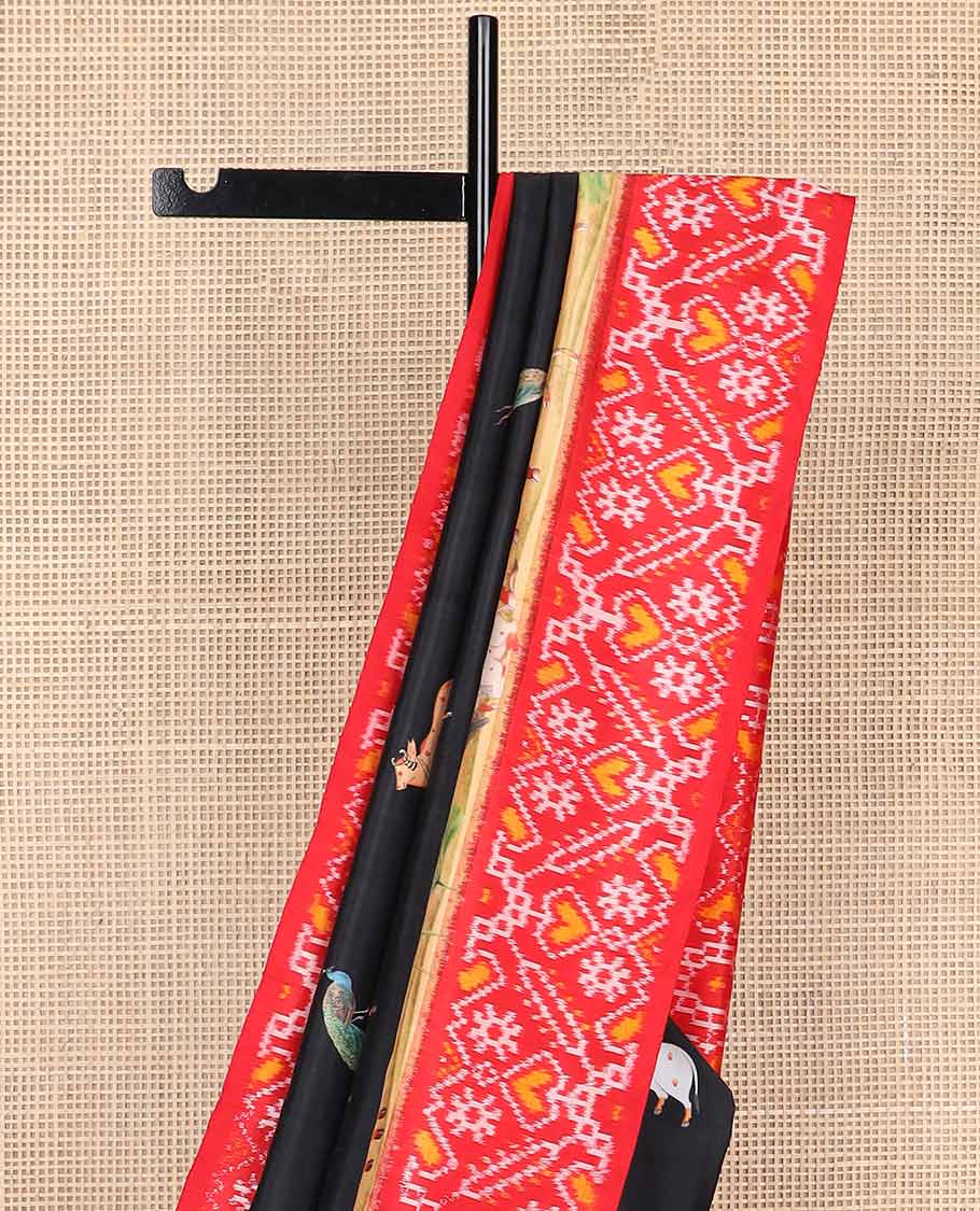 Black pichwai style design printed silk saree with contrast floral design & ikkat style floral design pallu