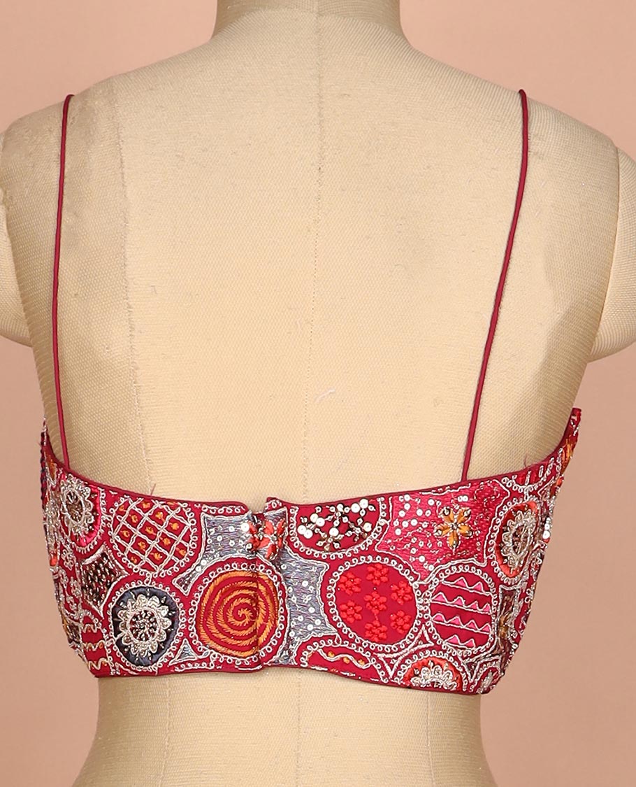 Maroon resham thread and sequins embroidered spaghetti sleeve V-neck readymade blouse