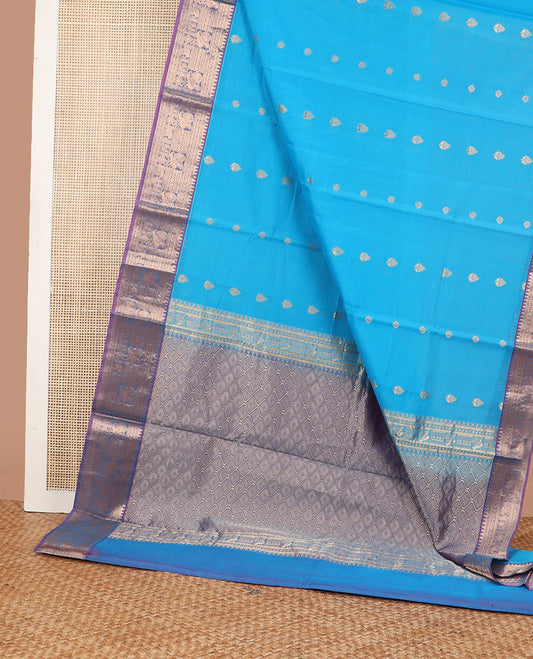 light blue motifs silk cotton saree with contrast zari design border & argyle design pallu