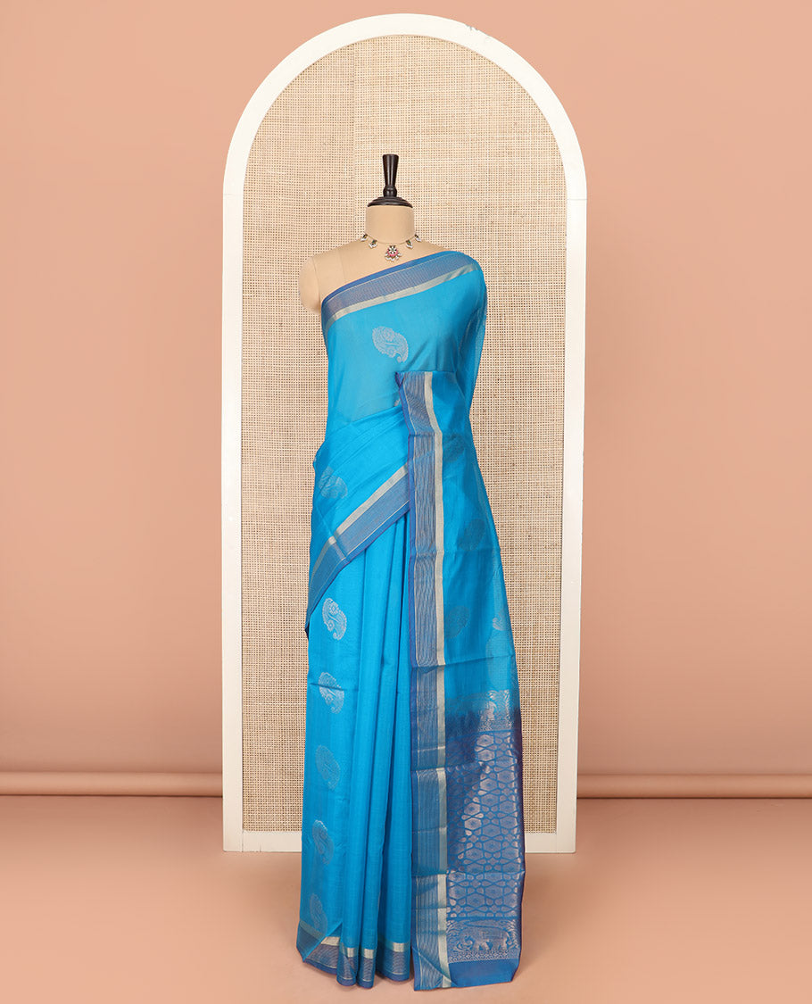Blue Silk Cotton Saree Decked Up with Buttas All Over the Body, Complemented by a Contrast Zari Striped Border, Featuring a Contrast Pallu of Geometric Zari Designs, and Paired with a Contrast Blouse