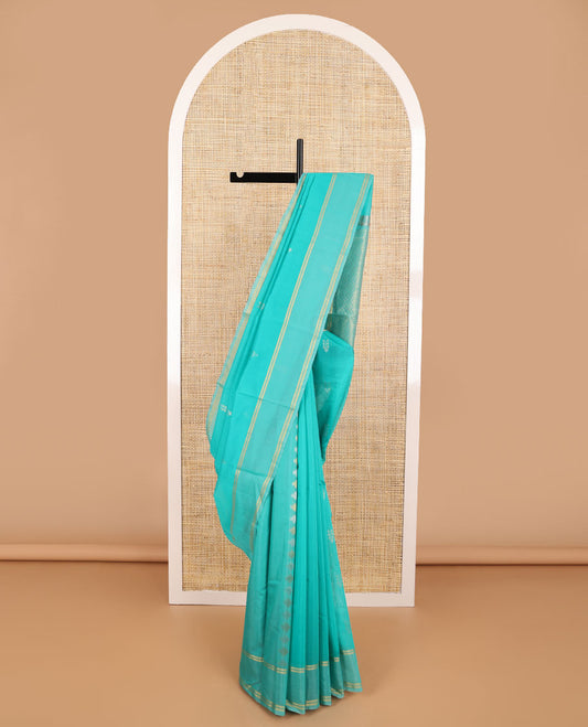 Blue floral design silk cotton saree with self zari border & chevron design pallu