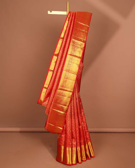 Red floral with checked design silk saree , self border of thilakam mokku,kuyil kann,kodi visiry design & intricate zari pallu