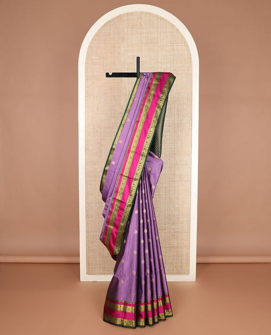Purple zari buttas soft silk saree, contrast traditional design zari rettai pettu border, and intricate pallu