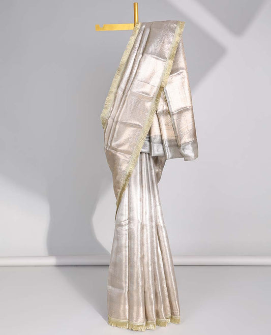 Beige checked , floral design tissue saree with self zari design & intricate zari design pallu