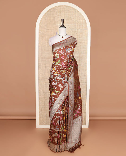 Brown floral vine and animal motifs meenakari design Matka silk saree, traditional design border, and intricate pallu