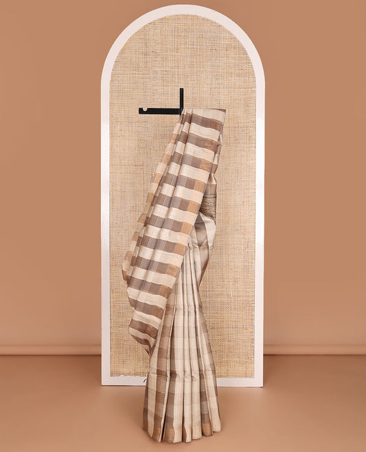 Borderless brown checked tussar saree, contrast paisley & ajrakh-style intricately printed pallu