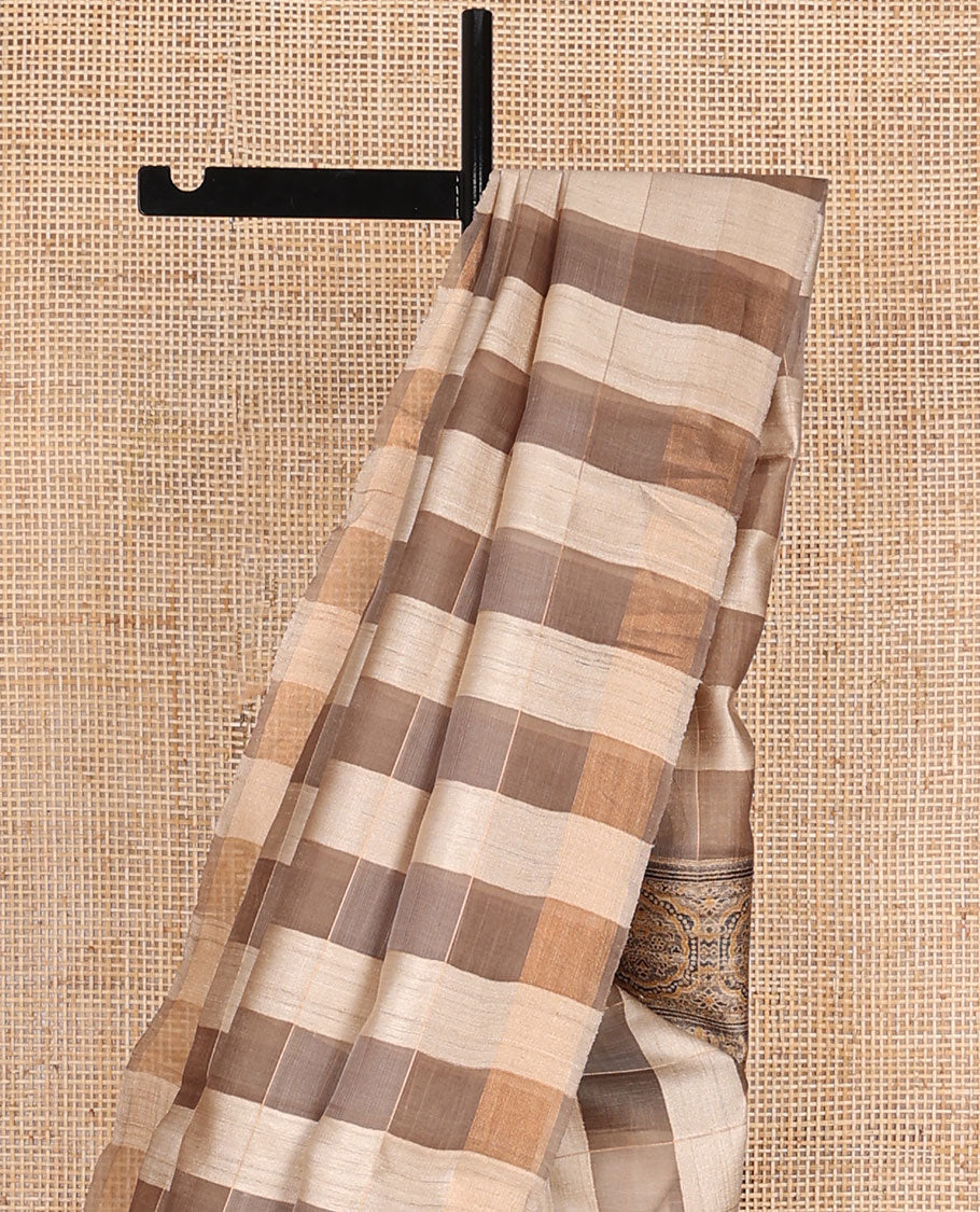 Borderless brown checked tussar saree, contrast paisley & ajrakh-style intricately printed pallu