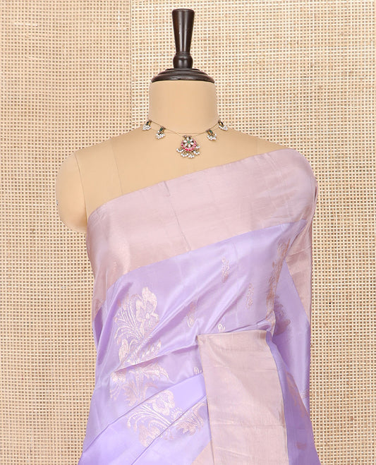 Lavender Semi Uppada Saree Gleamed Up with Floral Buttas, Complemented by a Bavanji Border, Contrast Pallu Steeped with Diagonal Zari Designs, and Paired with a Contrast Blouse
