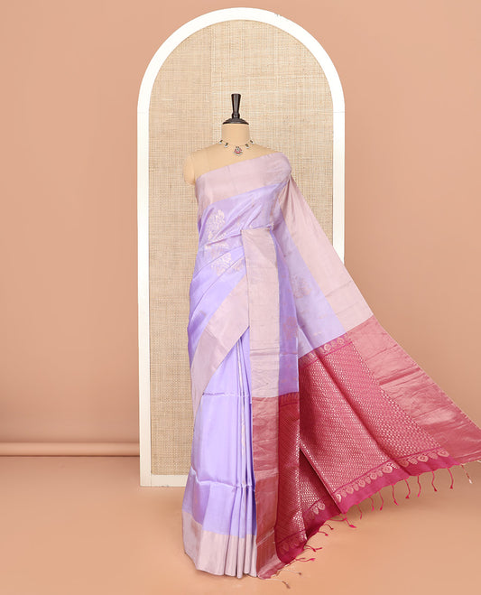 Lavender Semi Uppada Saree Gleamed Up with Floral Buttas, Complemented by a Bavanji Border, Contrast Pallu Steeped with Diagonal Zari Designs, and Paired with a Contrast Blouse