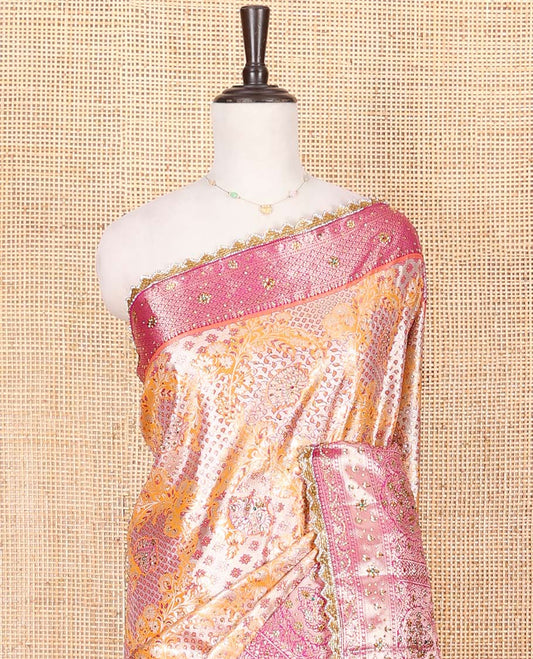 Orange Vastrakala Silk Saree, Gracefully Adorned with Floral Jacquard and Stone Work, Complemented by Contrast Zari and Stone-Embroidered Scallop Border, Grandly Zari and Stone Decked Up Pallu, and Paired with Contrast Embroidered Blouse