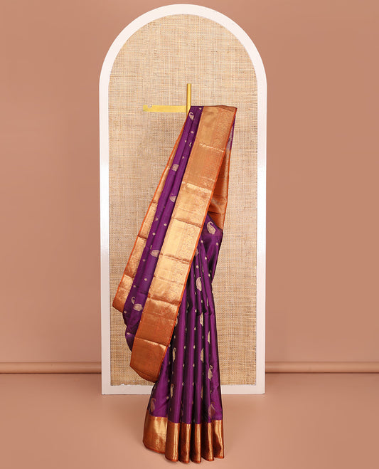 Purple Vasundhara Lite-Silk Mix Saree, Bedecked with Manga Buttas All Over Its Body, Complemented by a Contrast Border of Rekku, Muthu, Kamalam, and Mayil Designs, Grand Pallu of Ogee Designs, and Paired with a Contrast Blouse