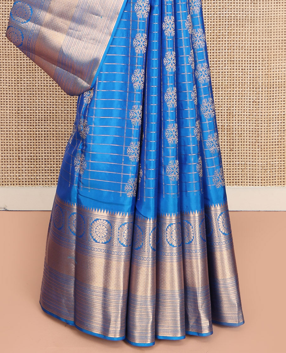 Blue Vasundhara Lite-Silk Mix Saree, Artfully Woven with Snowflake Buttas Enclosed Checks, Highlighted by Zari Border of Rekku, Chakram, Kathir, and Diamond Designs, Gleaming Jaal Pallu, and Paired with a Matching Blouse