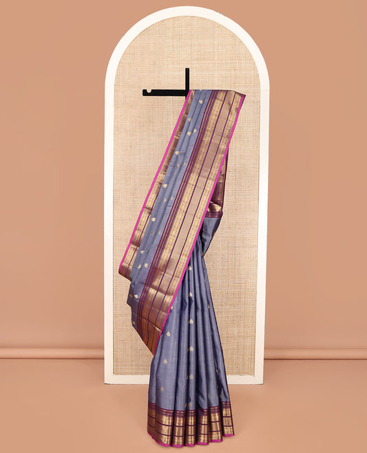 Grey Vasundhara Lite Silk Mix Saree, Elevated with Zari Buttas on Its Body, Complemented by Contrast Border of Rekku, Banaras, and Meen Designs, Grand Pallu Steeped with Paisleys, and Paired with a Contrast Blouse
