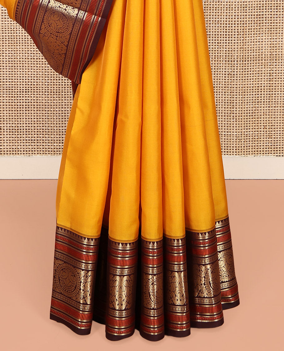 Yellow Plain Vasundhara Lite-Silk Mix Saree, Complemented by a Contrast Border of Muthu, Kathir, and Chakram Designs, Jaal Pallu, and a Contrast Blouse