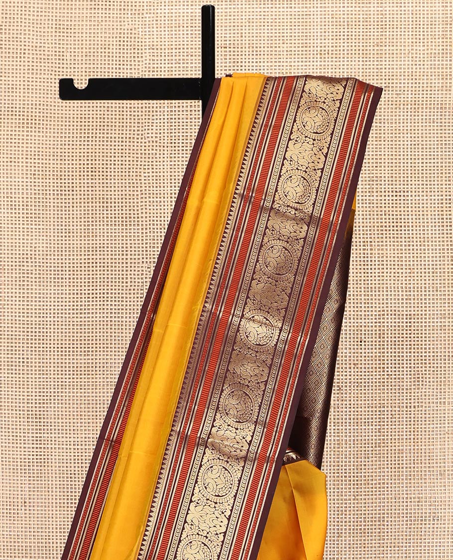 Yellow Plain Vasundhara Lite-Silk Mix Saree, Complemented by a Contrast Border of Muthu, Kathir, and Chakram Designs, Jaal Pallu, and a Contrast Blouse