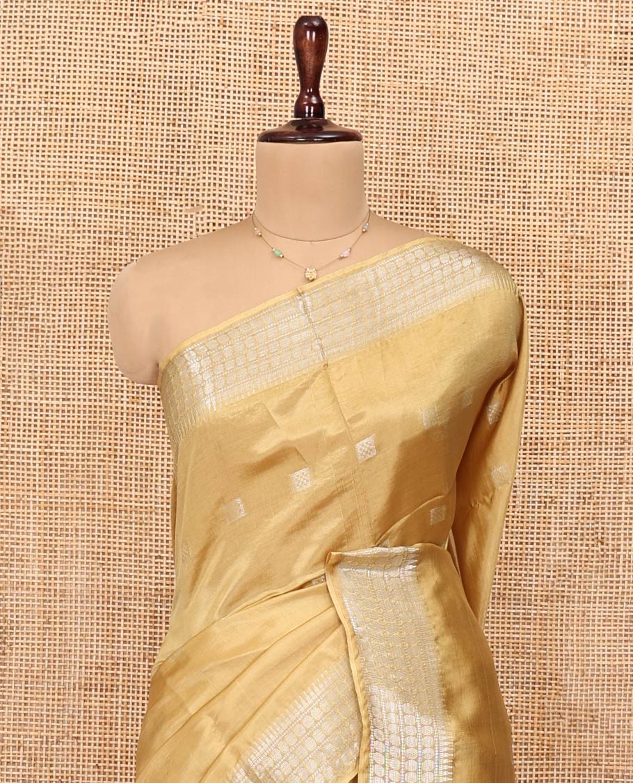 Sandal Banana Pith Saree, Subtly Woven with Square Buttas All Over Its Body, Subtle Traditional Border, Pallu of Buttas and Stripes, and Paired with a Matching Blouse