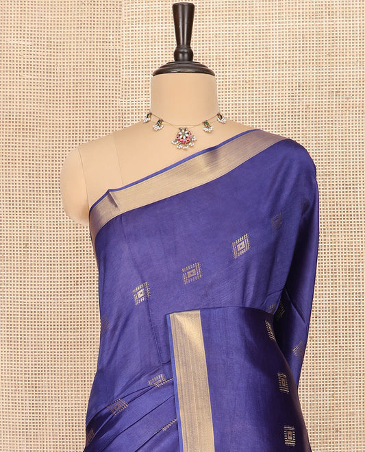 Blue Banana Pith Saree Spotlighted with Square Zari Buttas, Bavanji Border, Gleaming Zari Striped Pallu, and Paired with a Matching Plain Blouse
