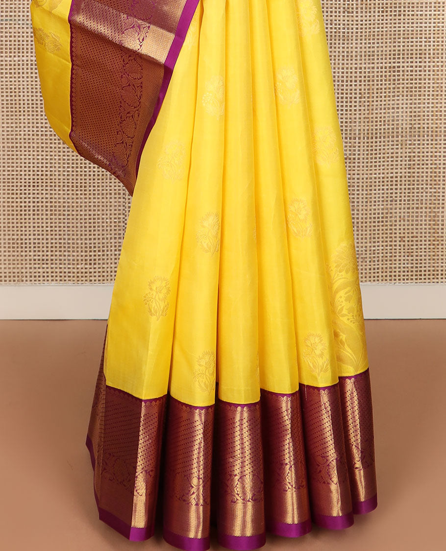 Yellow floral buttas silk saree, contrast border of salangai, ara bogudi, mayil kann & kodi visiry & seppu rekku pallu of floral motifs