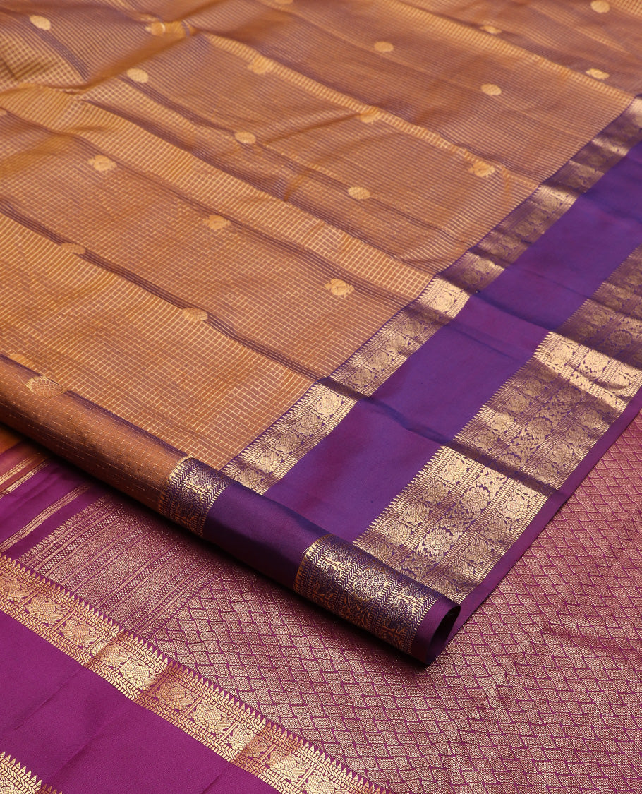 Brown micro-checked with annam chakram buttas silk saree, contrast rettai pettu border of ara bogudi, muthu, banaras,iruthalai pakshi and poo chakram, and jaal design pallu