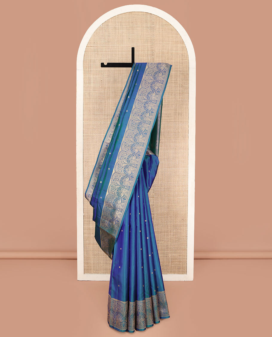 Blue Vasundhara Silk Saree, Accentuated with Zari Buttas All Over Its Body, Highlighted by a Zari Border of Manga and Yaanai Designs, Grand Geometric Patterned Pallu, and Paired with a Matching Blouse
