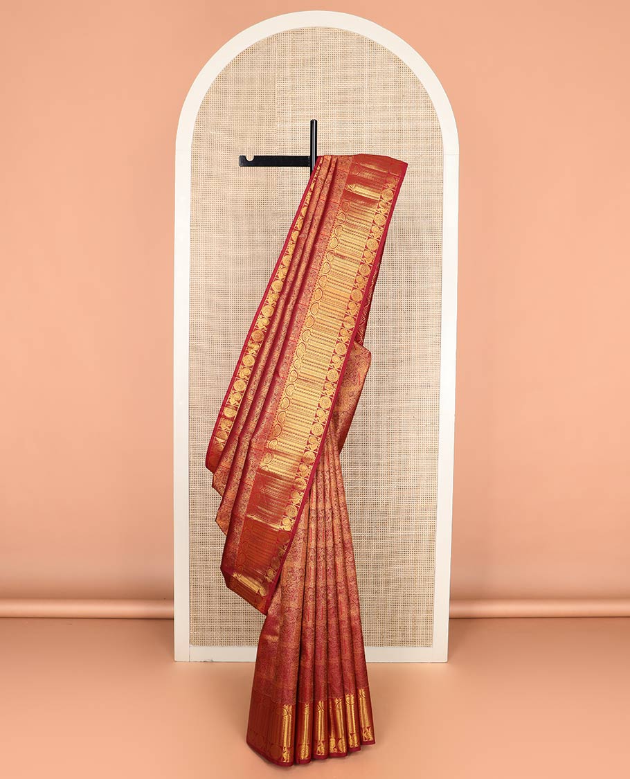 Light maroon jacquard Kanchipuram wedding silk saree, zari border of dhavana kodi, kathir, and mayil chakram, and ogee patterned pallu