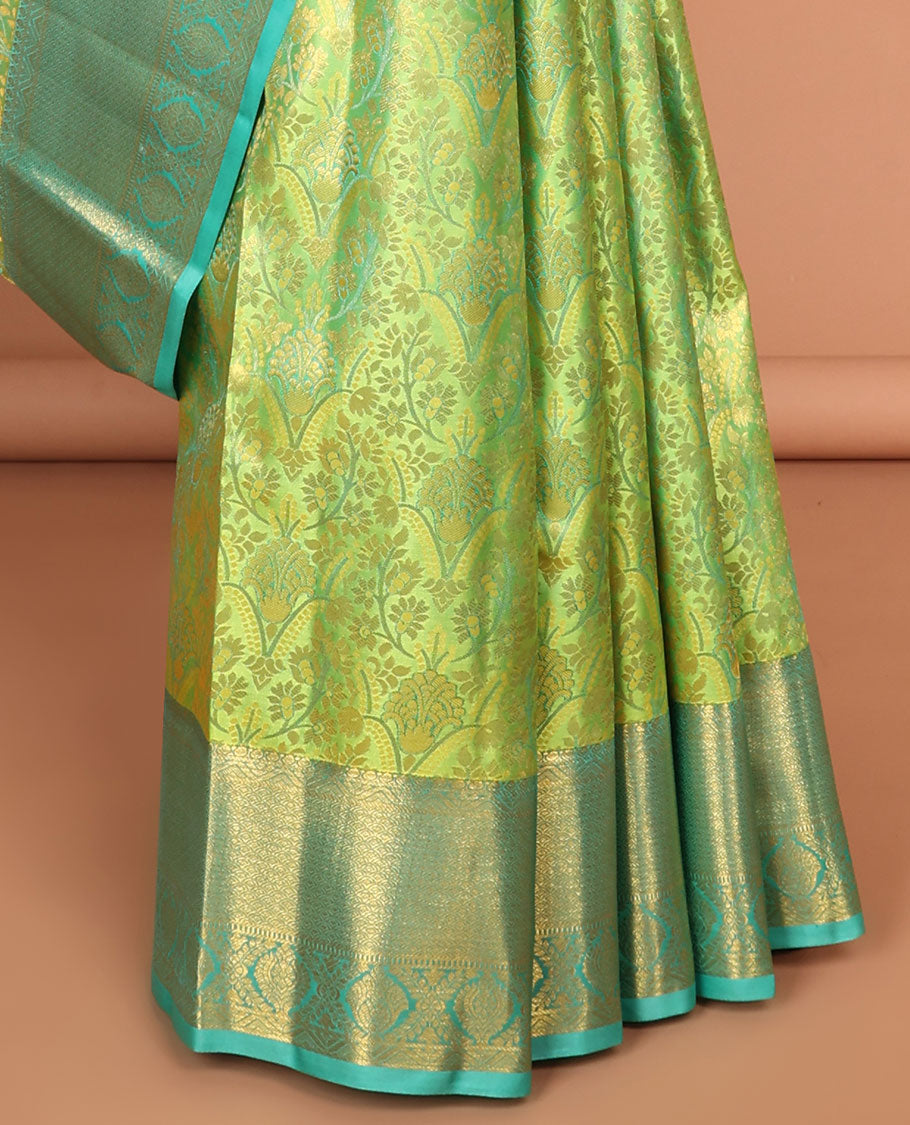 Green floral jacquard kancheepuram silk saree with contrast zari design border & argyle design pallu