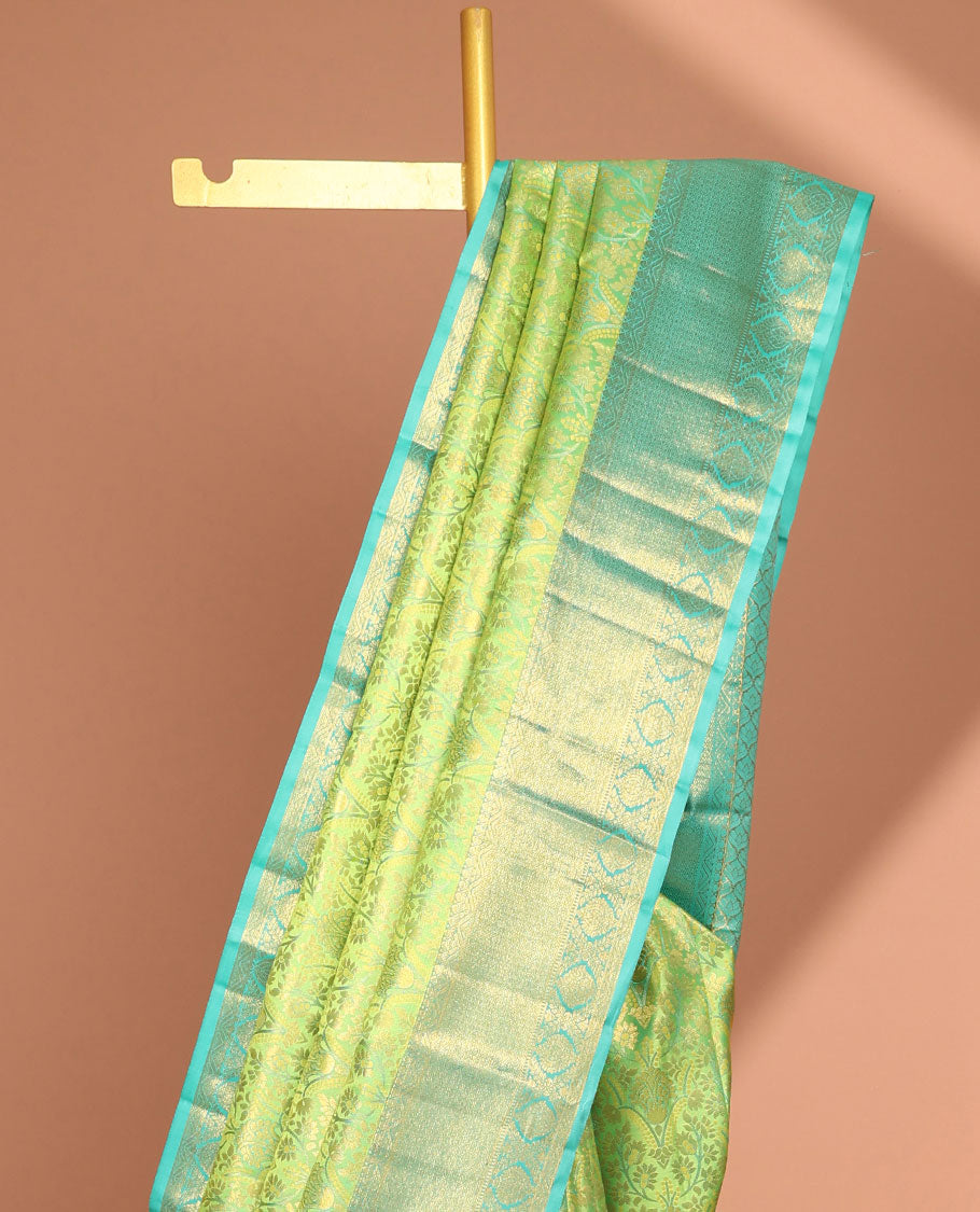 Green floral jacquard kancheepuram silk saree with contrast zari design border & argyle design pallu