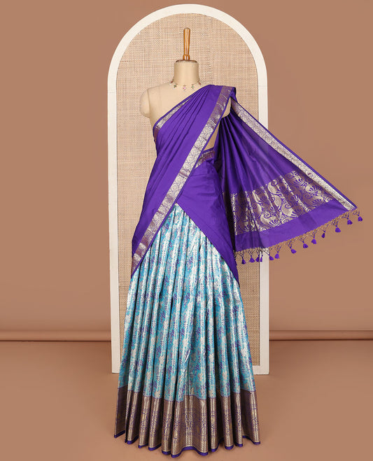 Blue art silk half saree, floral jacquard with contrast traditional zari border skirt, jacquard contrast blouse, and manga design dhavani