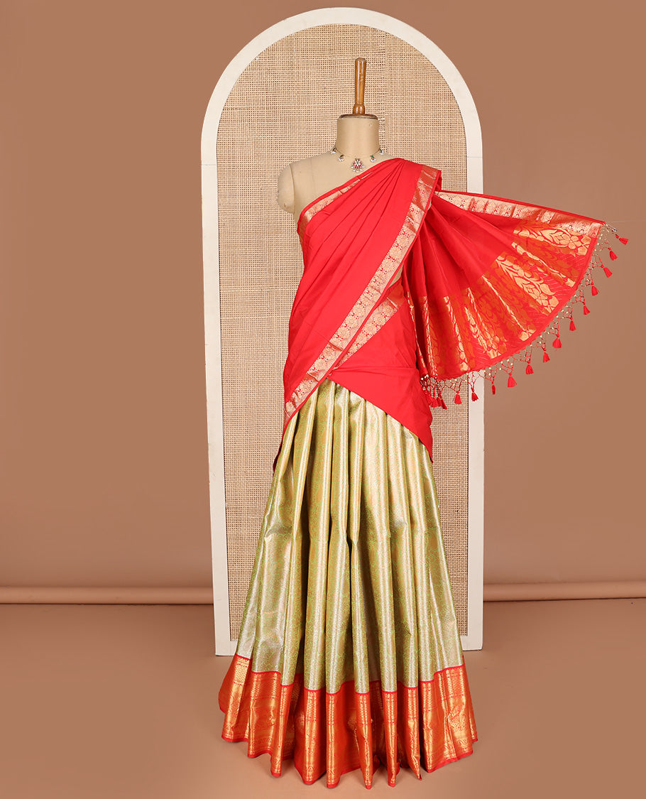 Green art silk half-saree pavadai material, jacquard with contrast traditional border skirt, jacquard blouse, and zari design dhavani